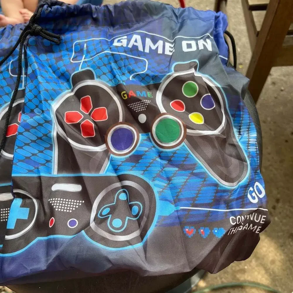 Set of 2 Game Controller Keychains and Game On Drawstring bag